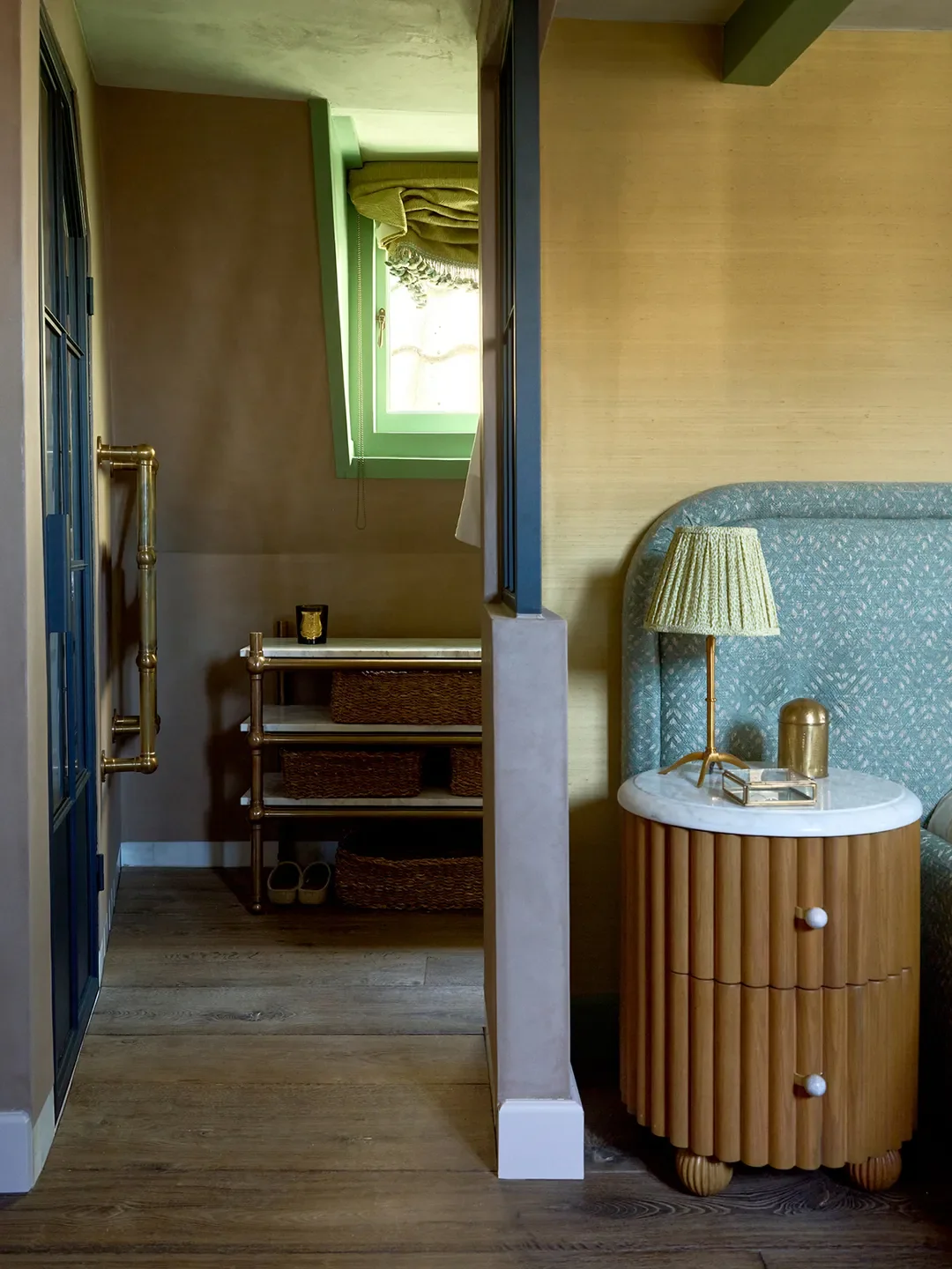 Lamp,Pookywith custom Pierre Frey shade; Nightstand,Soho Home; Headboard, RA Studio.