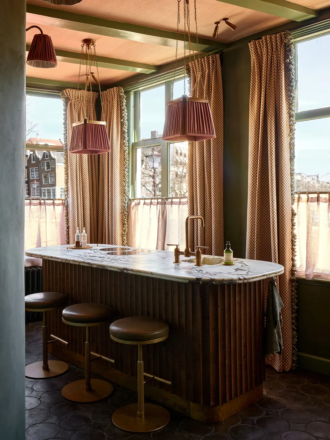 Counter stools,Soho Home; Pendants, RA Studio.