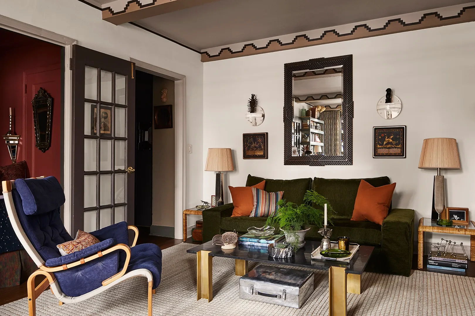 The apartment was the “landlord special” except for the oak floors, which were great. Everything else was white. I painted the ceiling, the trim, and the smaller rooms except the kitchen. I kept the w