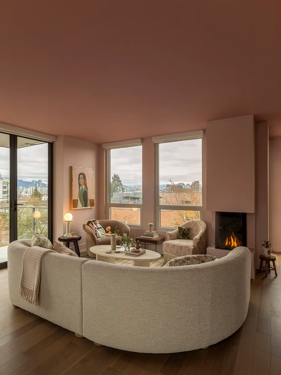 pink living room with white sofa
