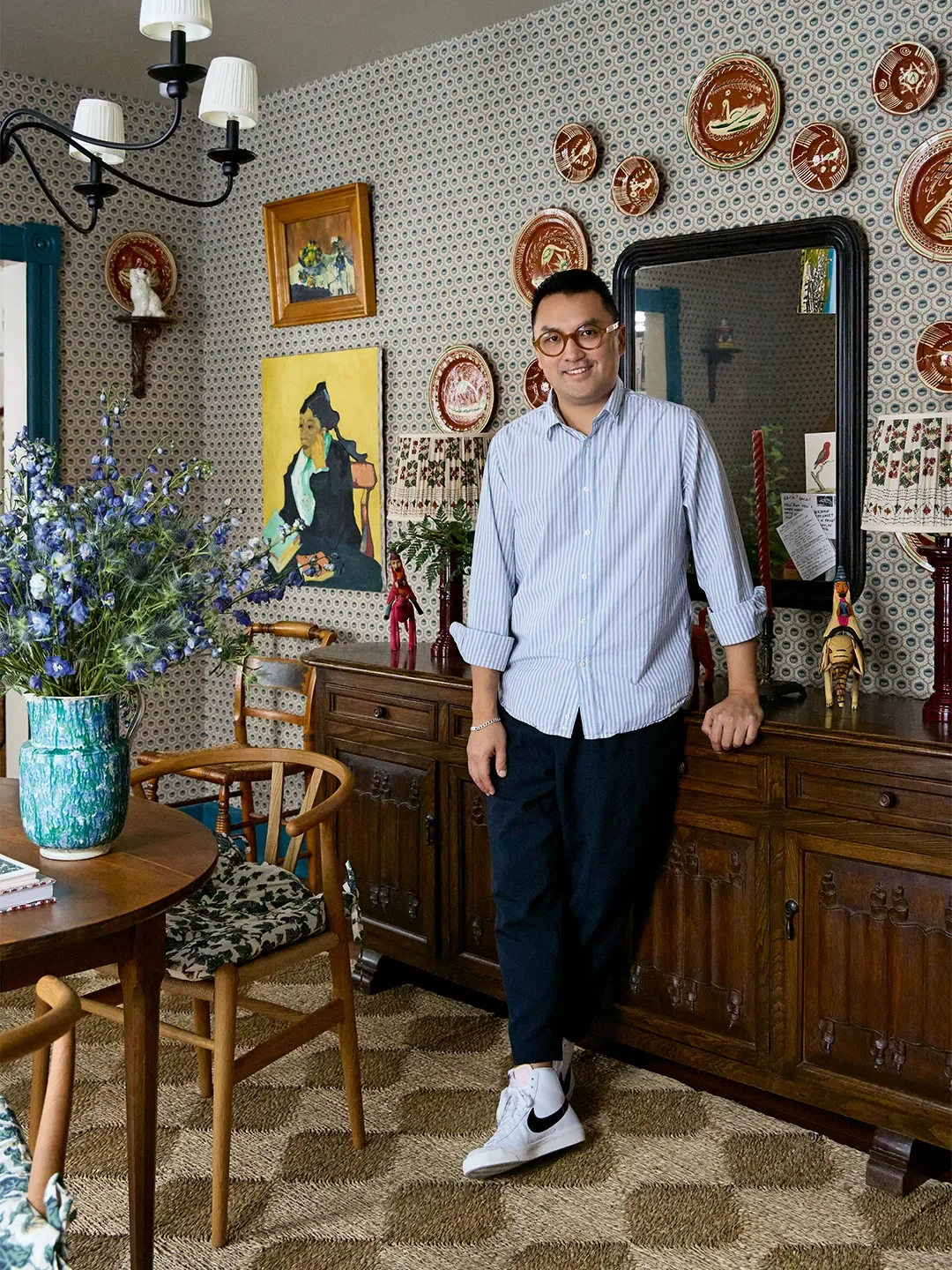 man standing in a room with checkered flooring