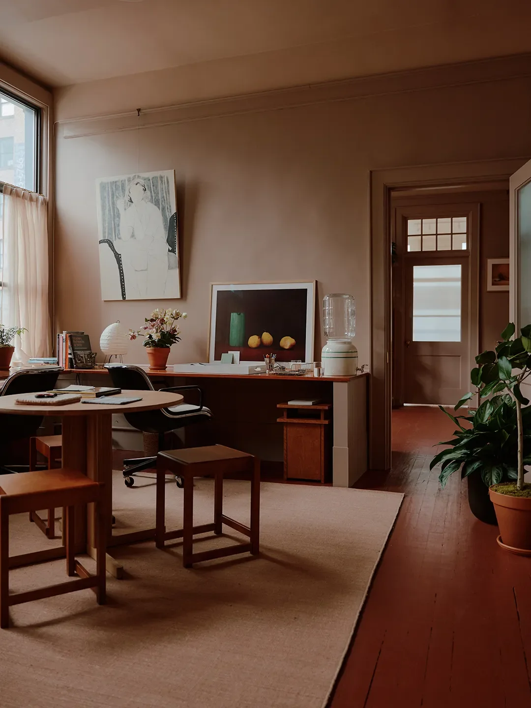 The materials library and more offices. Rug,Armadillo; Trefoil Table,Form + Refine; Low Stools,FRAMA; Desk Chairs, vintage Charles Pollock for Knoll; Paint,Dead SalmonandEtruscan Redby Farrow & Ball.