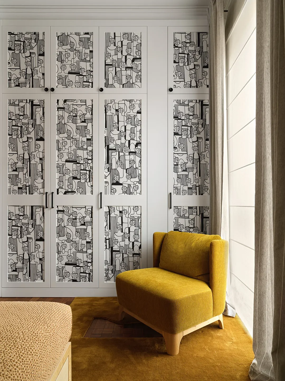 Armchair,Sits; Cabinet wallpaper, Pierre Frey; Rug, Nordic Knots.
