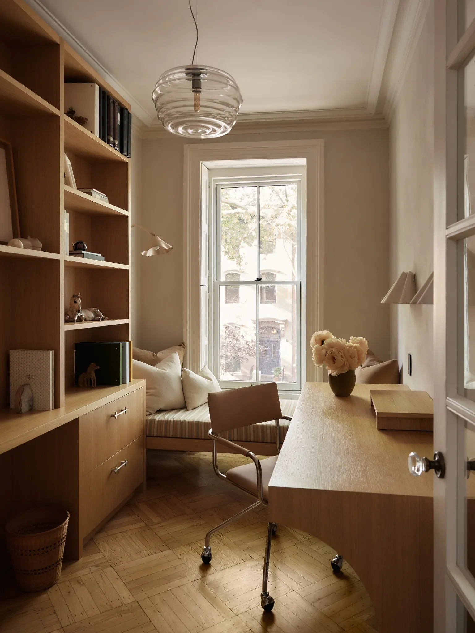His-and-hers offices on the second story were fitted with new millwork and utilized salvaged doors that once divided the parlor and kitchen.